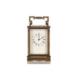 A French 'Anglaise' brass cased 8-day chiming carriage clock by Cattaneo of Paris. The white