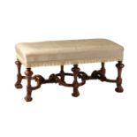 A William & Mary style walnut rectangular hearth stool, early 20th century, with stuff over top
