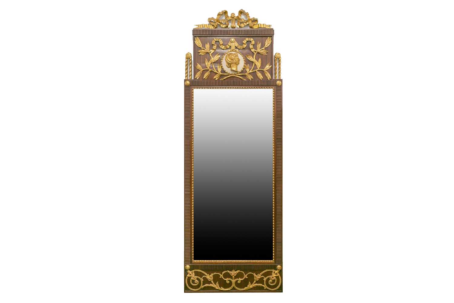 A Swedish Karl XIV Johan gilt-copper-mounted mahogany mirror Sweden, circa 1825. With a gilt