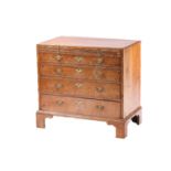 A George I figured walnut caddy topped bachelor's chest of four long drawers. With quartered top and