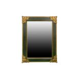 A large and impressive ebonized and parcel-gilt rectangular wall mirror, 20th century. With deep