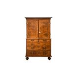 In the manner of Coxed & Woster, an early 18th-century burr walnut cabinet on chest c1700, with a
