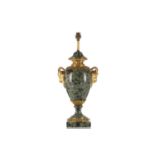 Green marble urn form table lamp, 20th century. With gilt bronze goat mask handles and fittings on a