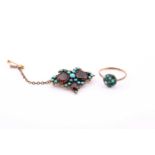 A Victorian garnet and turquoise butterfly brooch, 3cms wide; and a turquoise pave set ring, stamped