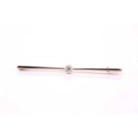 An old cut diamond set tie pin, consisting of a claw set old cut diamond with an estimated weight of