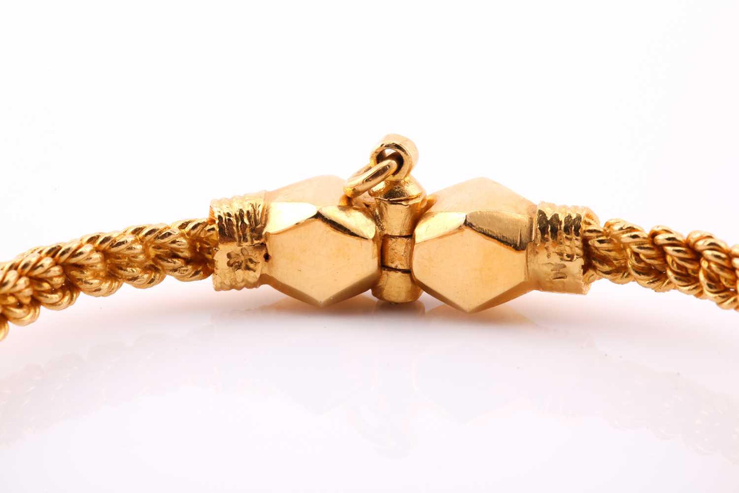 A yellow metal torque style bangle, the rope twist bangle with faceted terminals and screw-down - Image 3 of 3