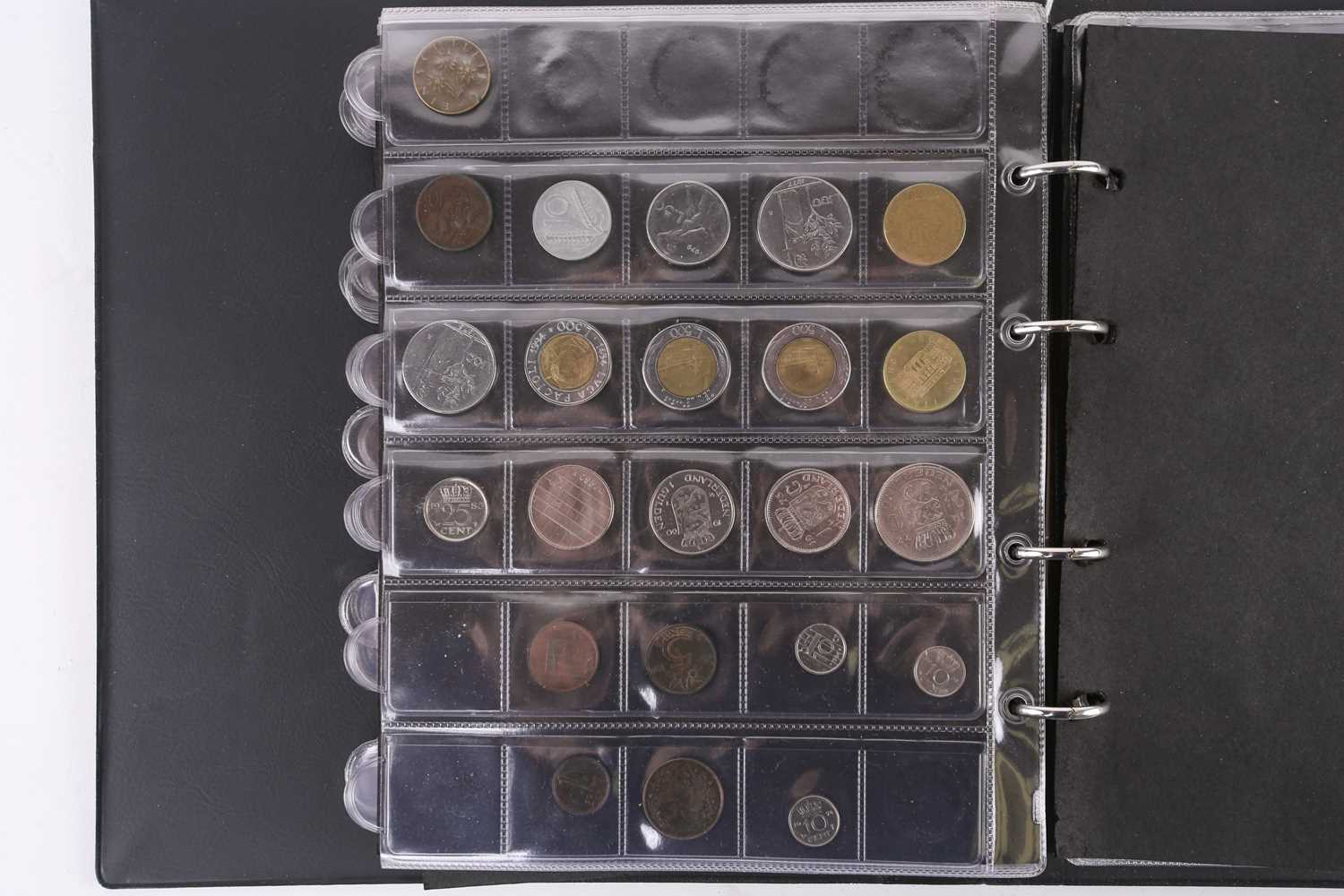 A lot consisting of a collection book of coins from all around the world including The United - Image 27 of 28