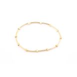 A Mappin and Webb 18ct yellow gold articulated necklace consisting of twelve sections in a rope