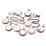 A collectors lot consisting of eight open face pockets watches, two Albert chains and a wristwatch