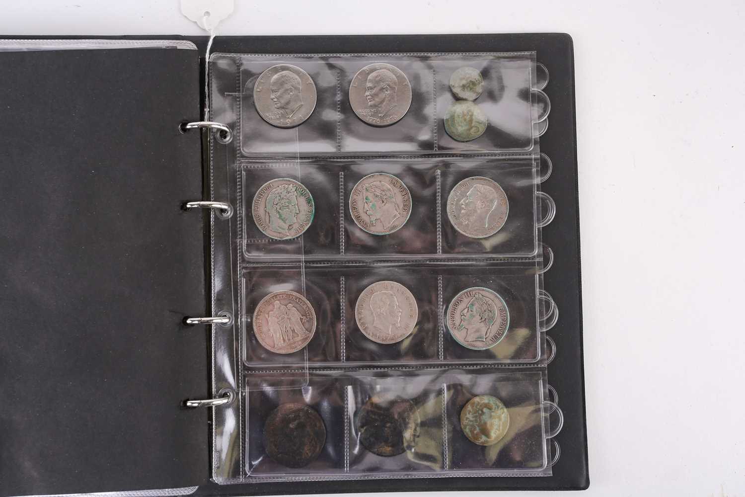 A lot consisting of a collection book of coins from all around the world including The United - Image 24 of 28