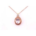 A Kunzite and diamond cluster pendant, in 18ct rose gold, modern assay marks, to a 9ct rose gold