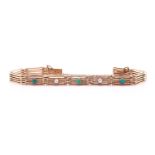 An Edwardian rose gold gate link bracelet, set with three turquoise coloured round cabochons