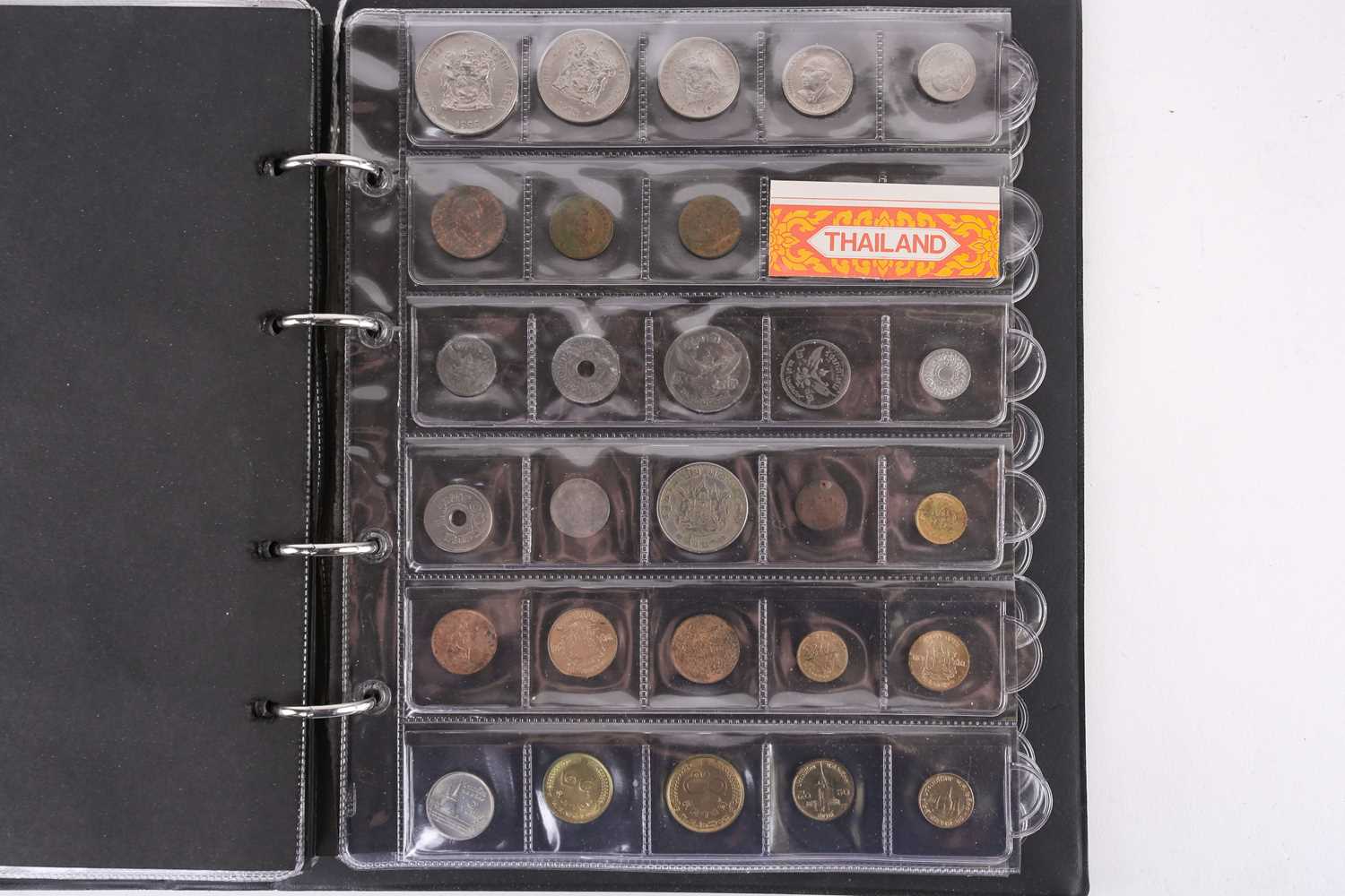 A lot consisting of a collection book of coins from all around the world including The United - Image 19 of 28