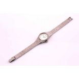 A silver Longines hand-wound ladies wristwatch, with a 19mm case, silver textured dial with