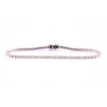 A diamond line 'tennis' bracelet consisting of approximately 3.00ct of round brilliant cut diamond