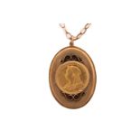 A Victorian sovereign pendant, set in 9ct gold oval mount on a yellow metal chain stamped 9ct and