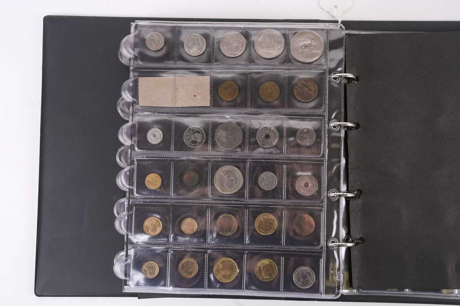A lot consisting of a collection book of coins from all around the world including The United - Image 26 of 28