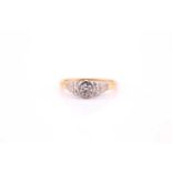 A single stone diamond ring, the brilliant cut diamond in 18 carat gold and platinum mount with