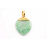 A heart shape jade pendant, measuring 22.4x29mm approximately on a yellow metal top loop, total