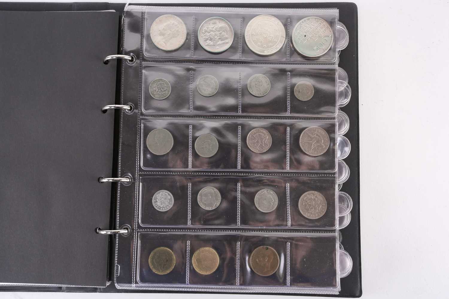 A lot consisting of a collection book of coins from all around the world including The United - Image 13 of 28