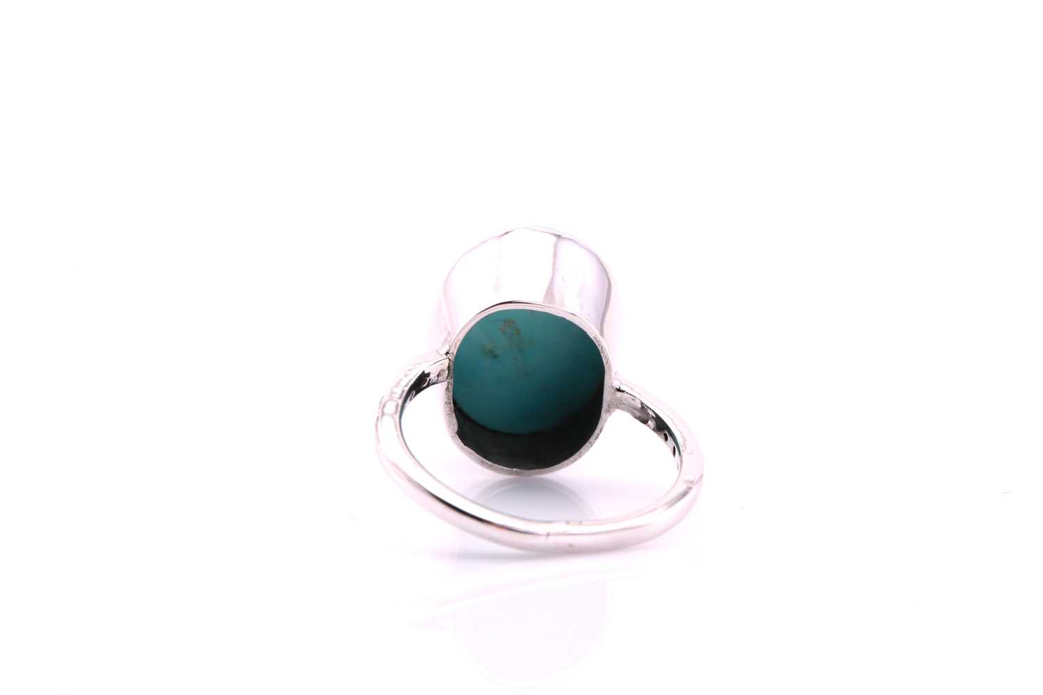 A turquoise and diamond ring, the oval cabochon turquoise, 17.4mm by 13.6mm set in white metal - Image 4 of 4