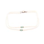 Charity lot South Bucks Hospice A double string of freshwater pearls and jade beads, the necklace
