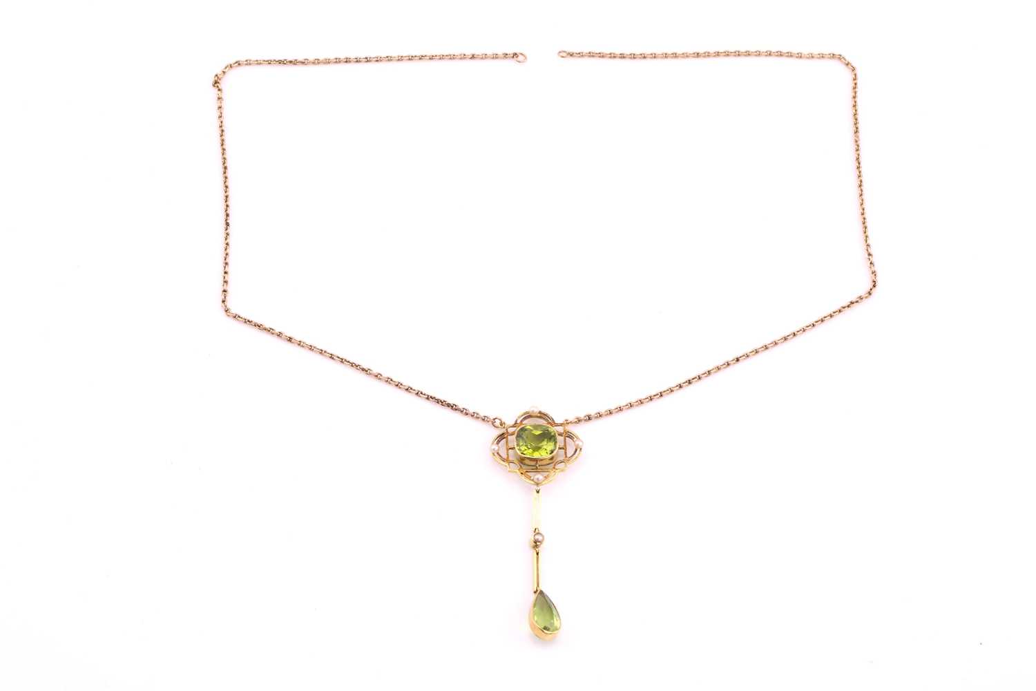 A peridot pendant necklace, early 20th century, the pendant centred by a cushion shape peridot, - Image 2 of 3
