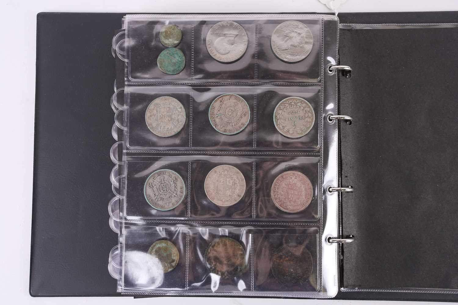 A lot consisting of a collection book of coins from all around the world including The United - Image 22 of 28