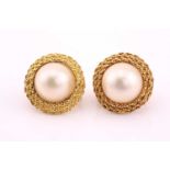 Pair of Mabe pearl earrings, each centred by a 15.5mm diameter mabe pearl within a yellow three