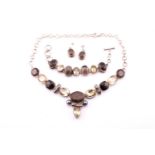 A smoky quartz, citrine and pearl necklace, a similar design bracelet, and pair of matching smoky