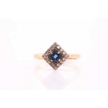 Sapphire and diamond square panel cluster ring, the 4mm square sapphire within a surround of round