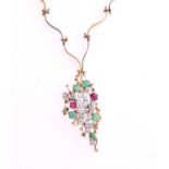 A diamond and ruby cluster pendant and chain; the abstract drop pendant comprising a central old