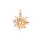 A Victorian yellow metal seed pearl starburst brooch, with a seed pearl set in central with