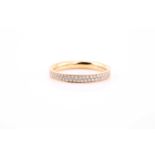 Georg Jensen. An 18ct yellow gold 'Magic' eternity ring, pave set with round brilliant-cut diamonds,