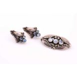 Georg Jensen- brooch set with three cabochon moonstones, No156, post 1945 makers mark 4.4cm wide,