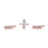 Three stones diamond ring and pair of matching earrings, the ring consists of three round