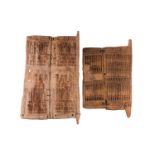 Two Dogon carved hardwood granary doors, Mali, mid-twentieth century, the larger carved with