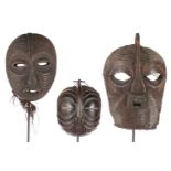 Three Luba Kifwebe masks, Democratic Republic of Congo, the larger masks with deep incised carved