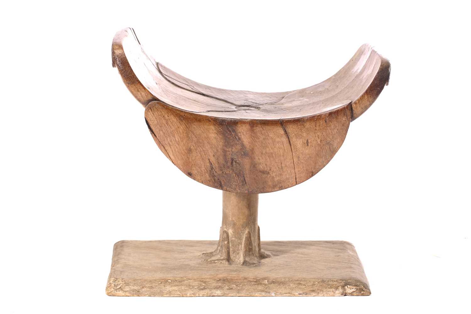 An Ashanti stool, Ghana, the dished top of carved petal form on a circular column with carved - Image 4 of 4