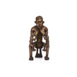 A Bamun mother and child group, Cameroon, 20th century, carved wood figures covered in brass