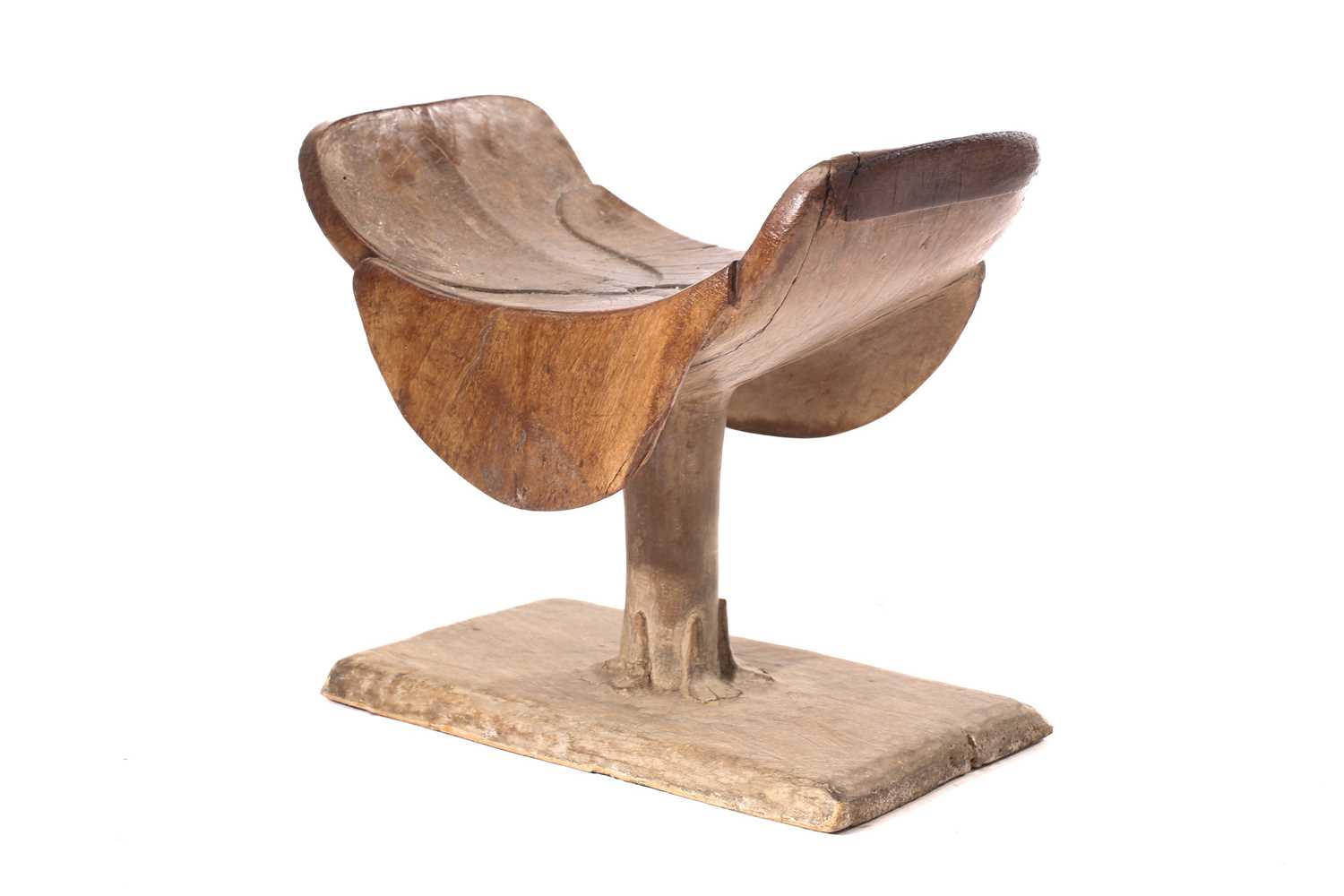An Ashanti stool, Ghana, the dished top of carved petal form on a circular column with carved - Image 3 of 4