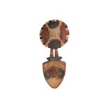A Bwa plank mask, Burkina Faso, the spade shape mask with protruding circular eyes and mouth, with
