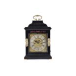 A George I/II ebonized twin fusee repeat chiming table clock, The inverted bell top case with a