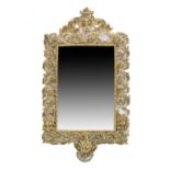 A Victorian cast and gilt brass wall mirror with Vitruvian scroll border and Athene and satyr mask