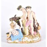 A Meissen porcelain figure group of the Drunken Silenus, 19th century, supported by Bacchus, a