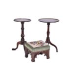 A Regency dish topped circular mahogany wine table with an urn column and inverted sure supports