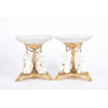 A pair of gilt metal and moulded glass bonbon dishes, the part frosted dished glass with Greek key