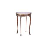 A Louis XVI style mahogany topped oval side table with single frieze drawer and with gilt metal