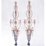 A pair of carved wood and gilt lacquered neo-classical two branch wall lights with electric