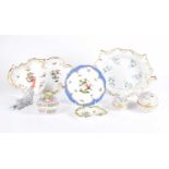 An assortment of eight items of Herend porcelain, lot consists of a fishnet cat with a ball, three